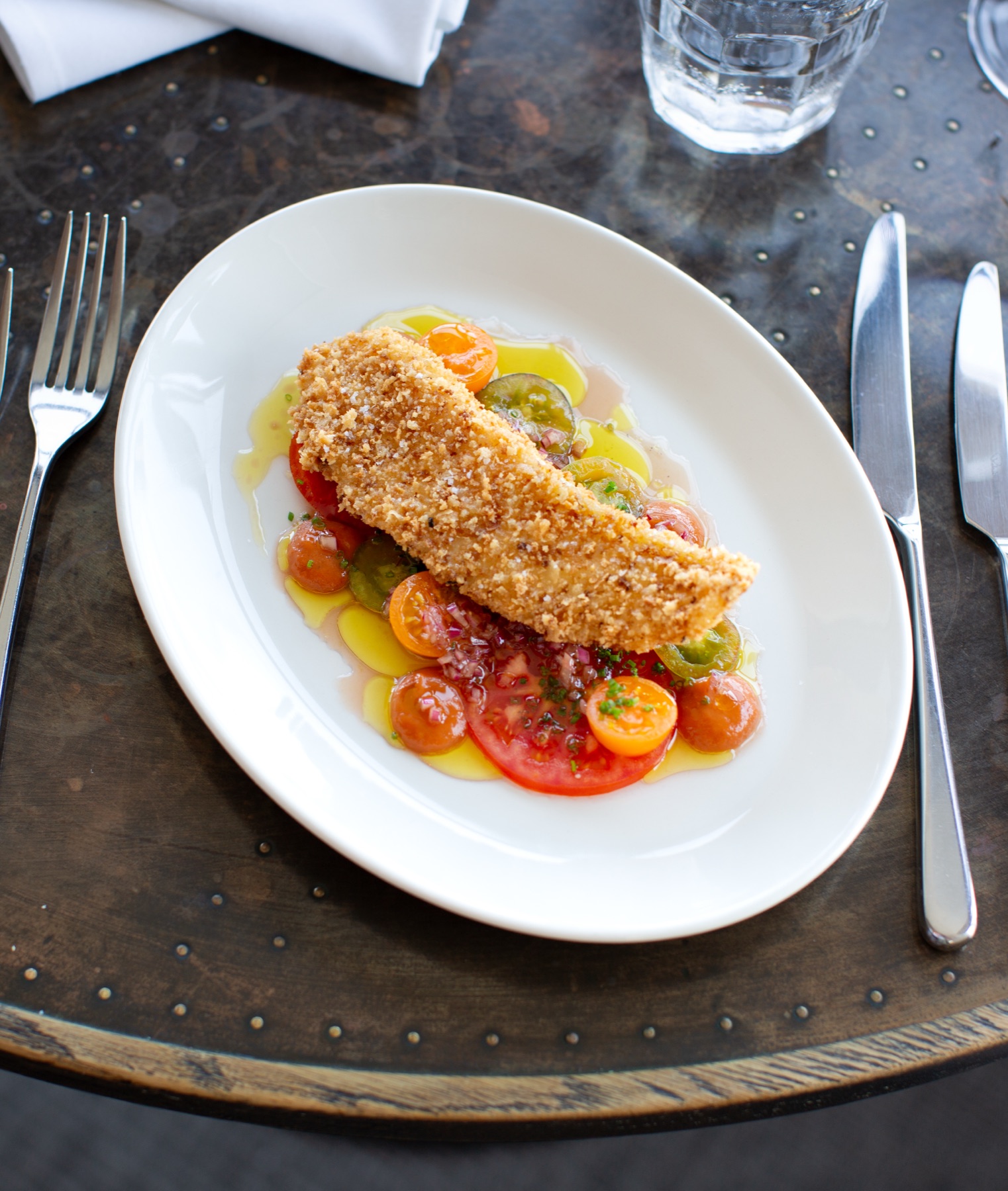 Breaded lemon sole with heritage tomato salad